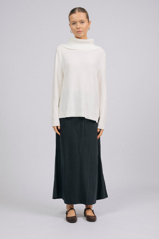 Vintage white knit turtleneck long sleeved top with ribbed trim and delicate stitch detail front view - Lemon Lane Vintage