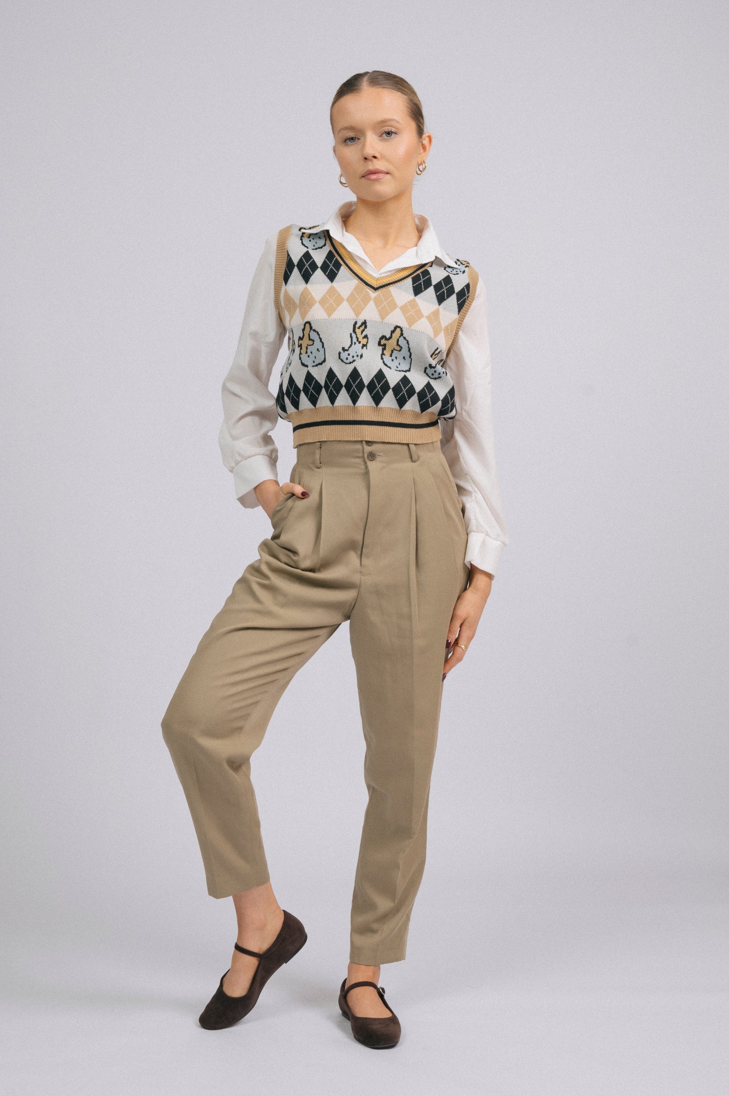 Vintage tailored high-waisted khaki green pants with pockets front view - Lemon Lane Vintage