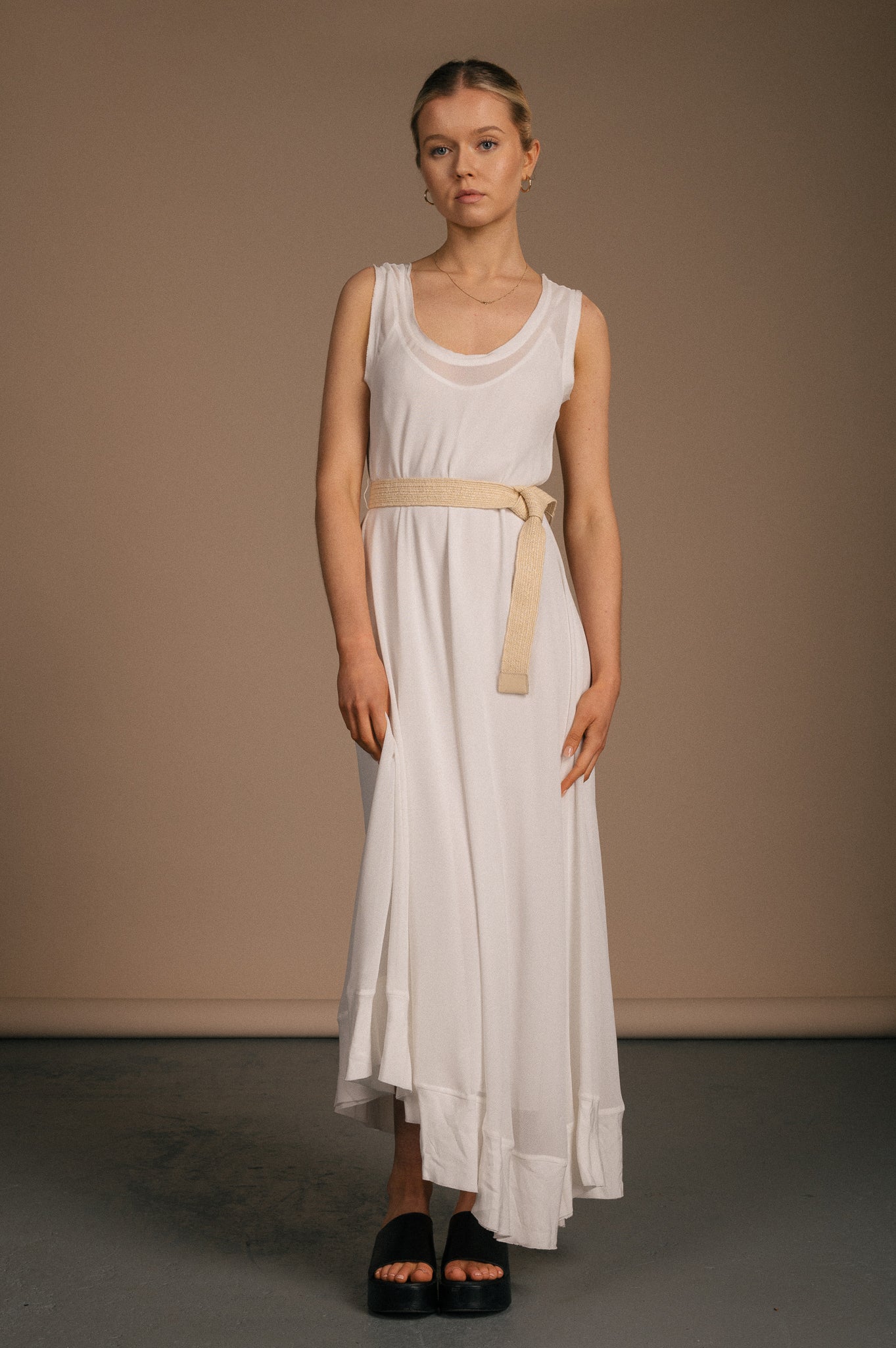 Vintage asymmetric white slip dress with rope waist tie front view - Lemon Lane Vintage