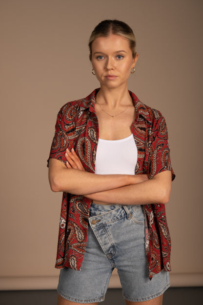 Vintage burnt orange paisley collared short sleeve button-up shirt front view - Lemon Lane Vintage