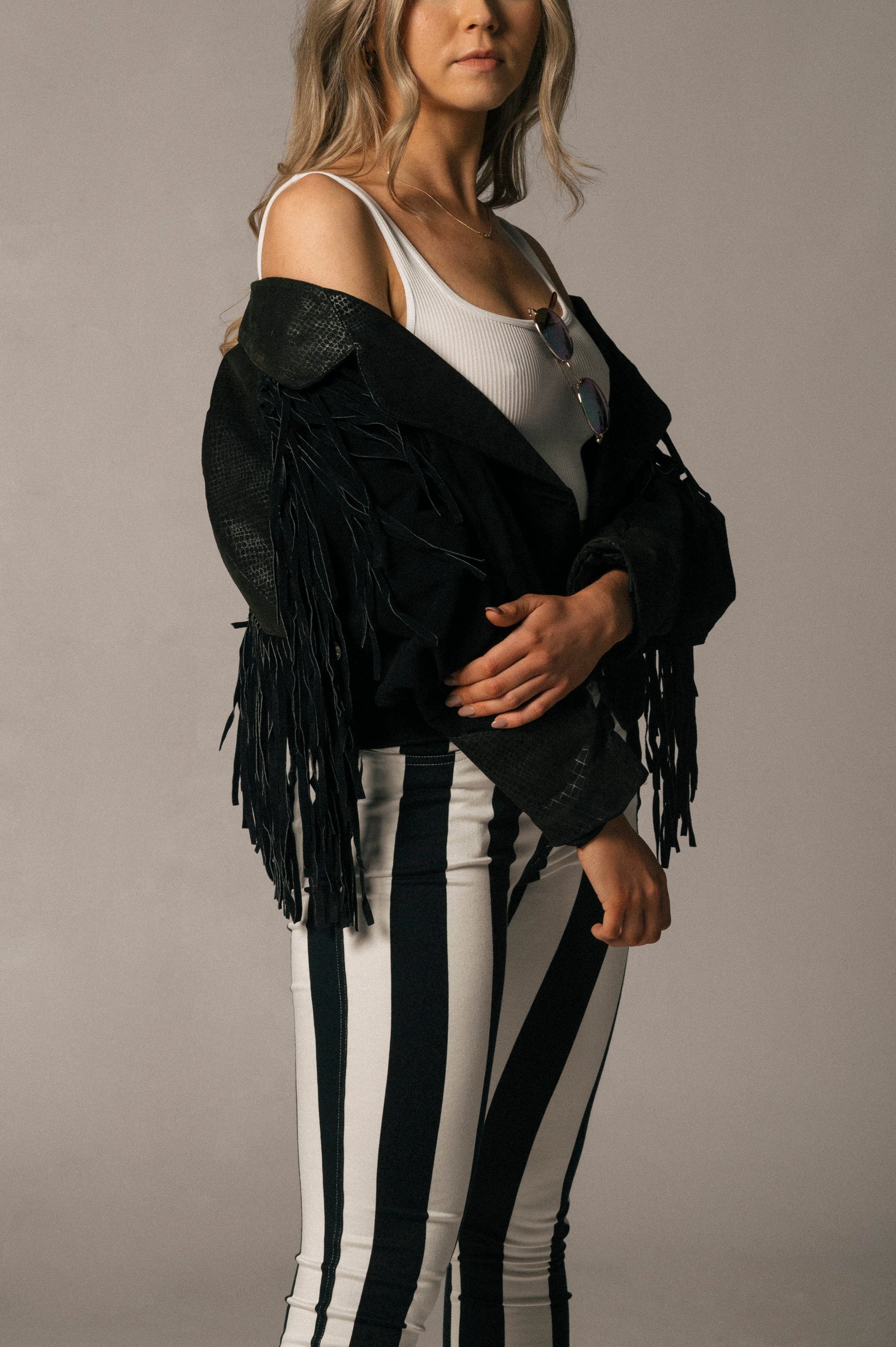 Vintage fringe bomber style black suede jacket side view - Lemon Lane Vintage