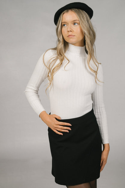 Vintage A-line black mini skirt front view - Lemon Lane Vintage