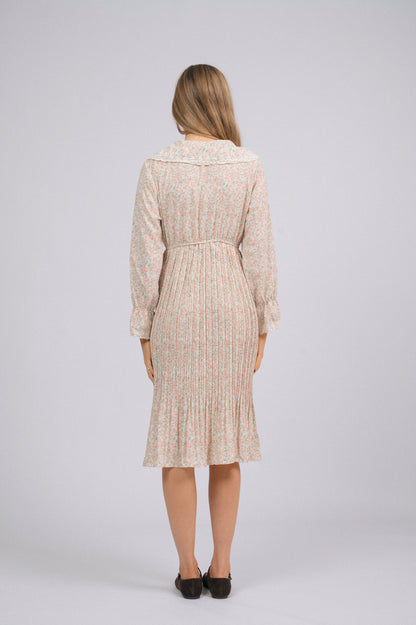 Vintage light pink 1940s-style floral long sleeved midi dress with lace trim, peter pan collar, bell sleeves, and front buttons cottage core prairie style back view - Lemon Lane Vintage