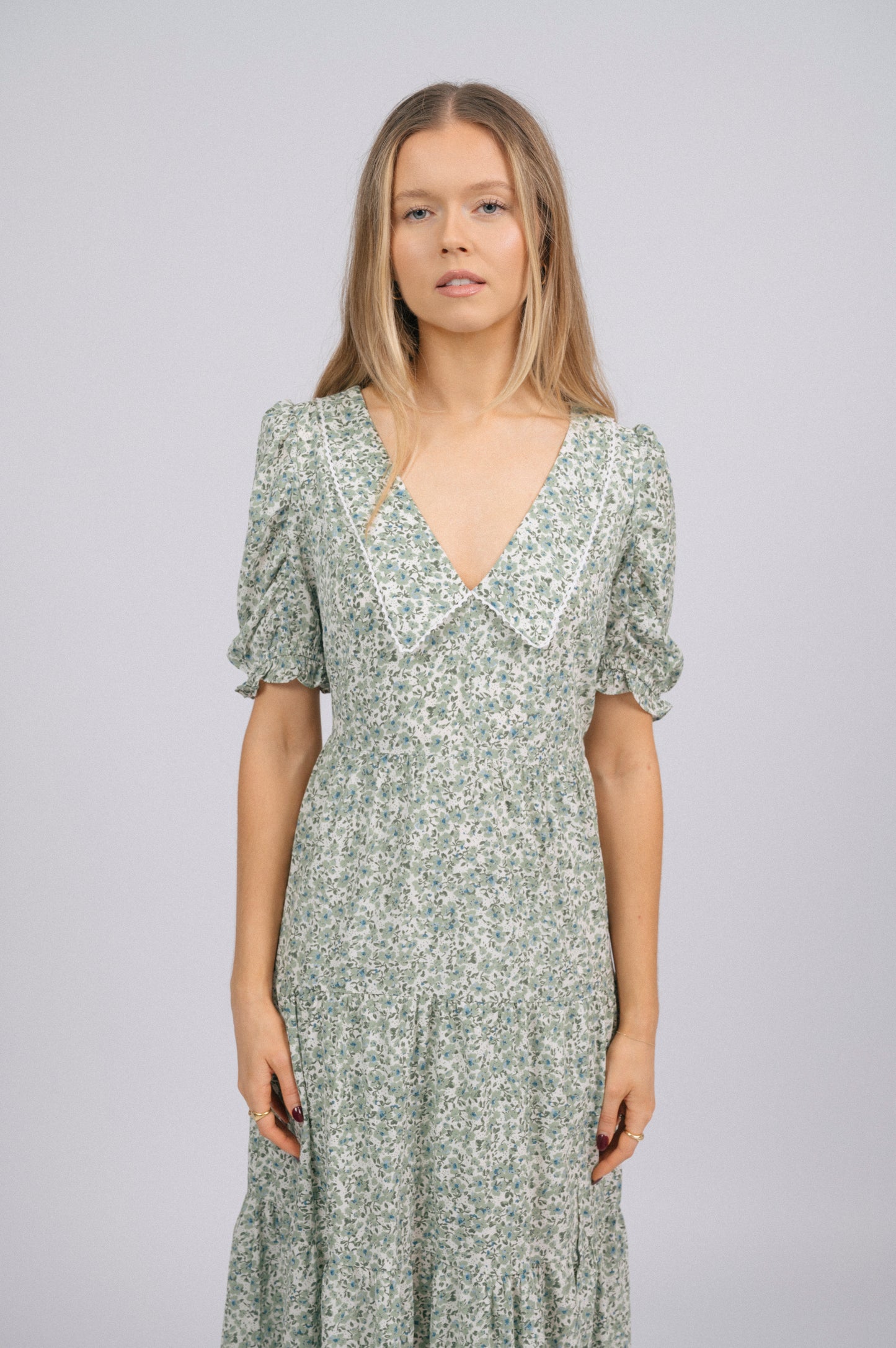 Vintage cottage core green floral tiered midi dress lace trim, soft peter pan collar, and floral fabric texture detail - Lemon Lane Vintage