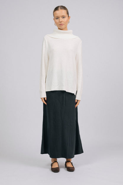 Vintage white knit turtleneck long sleeved top with ribbed trim and delicate stitch detail front view - Lemon Lane Vintage