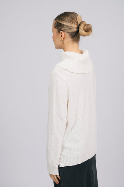 Vintage white knit turtleneck long sleeved top fabric texture, neckline and sleeve detail - Lemon Lane Vintage