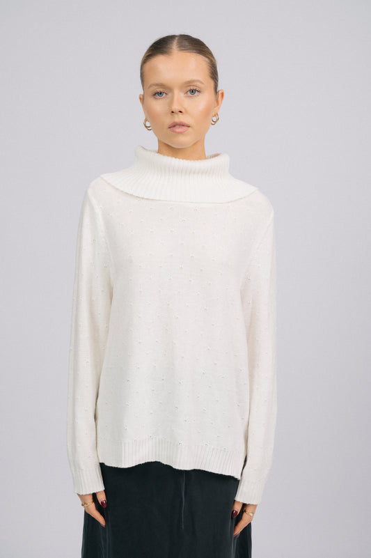 Vintage white knit long sleeved turtleneck top with ribbed trim and delicate stitch detail front view - Lemon Lane Vintage