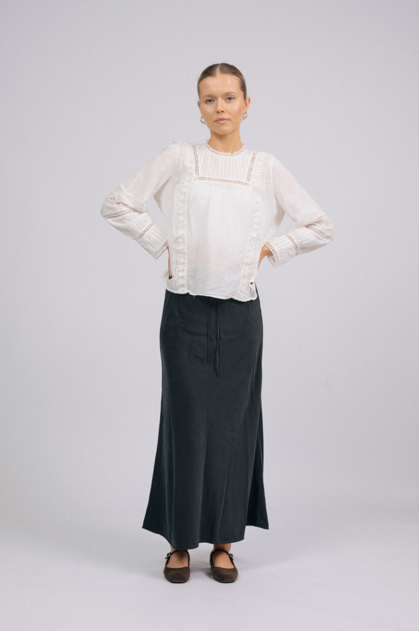 Vintage long sleeved white blouse with lace detailing front view - Lemon Lane Vintage