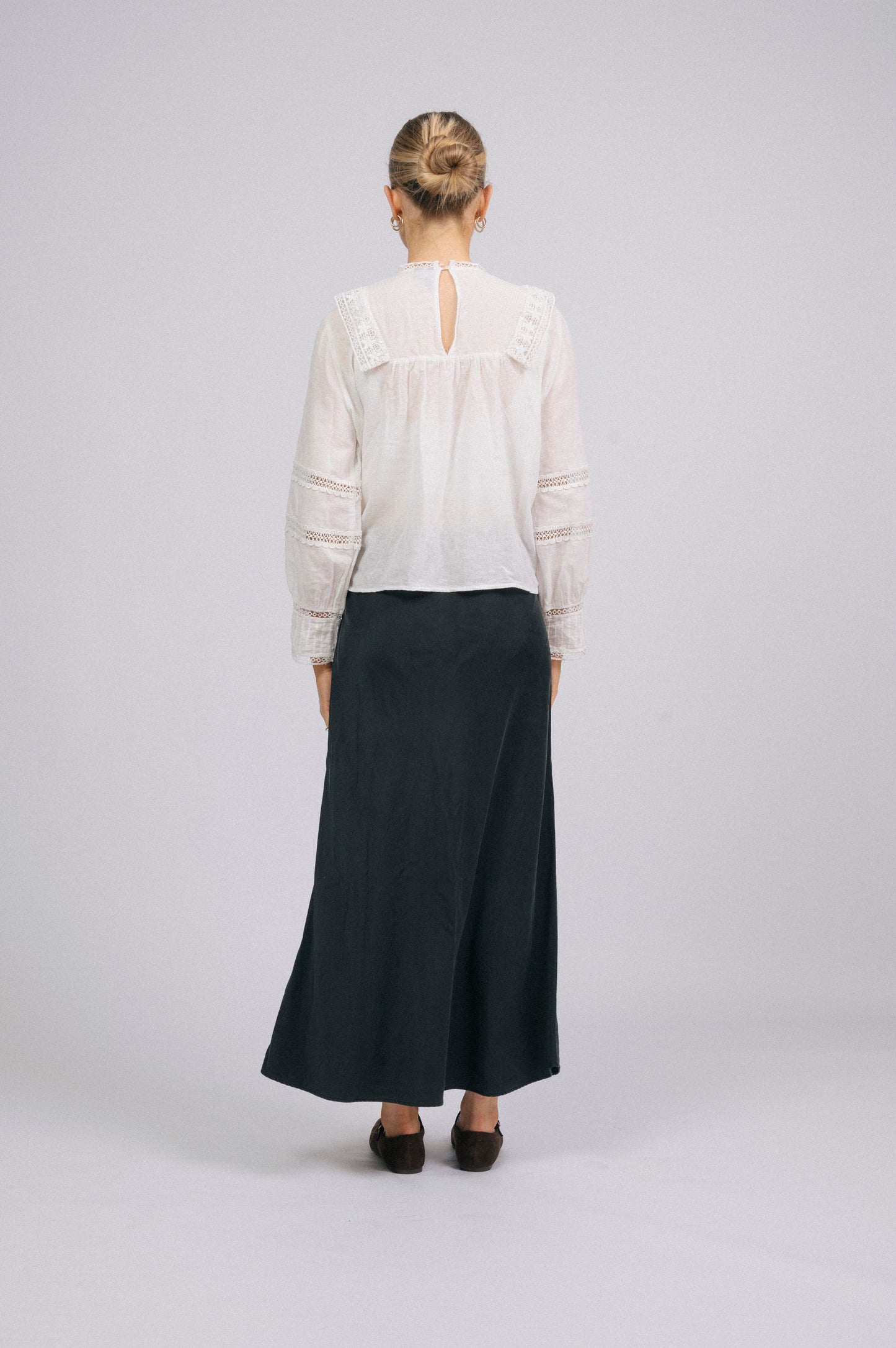 Vintage long sleeved white blouse with lace detailing back view - Lemon Lane Vintage