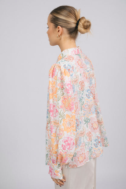Vintage white floral long sleeved button-up collared shirt collar, puffy sleeves, and cuff detail - Lemon Lane Vintage