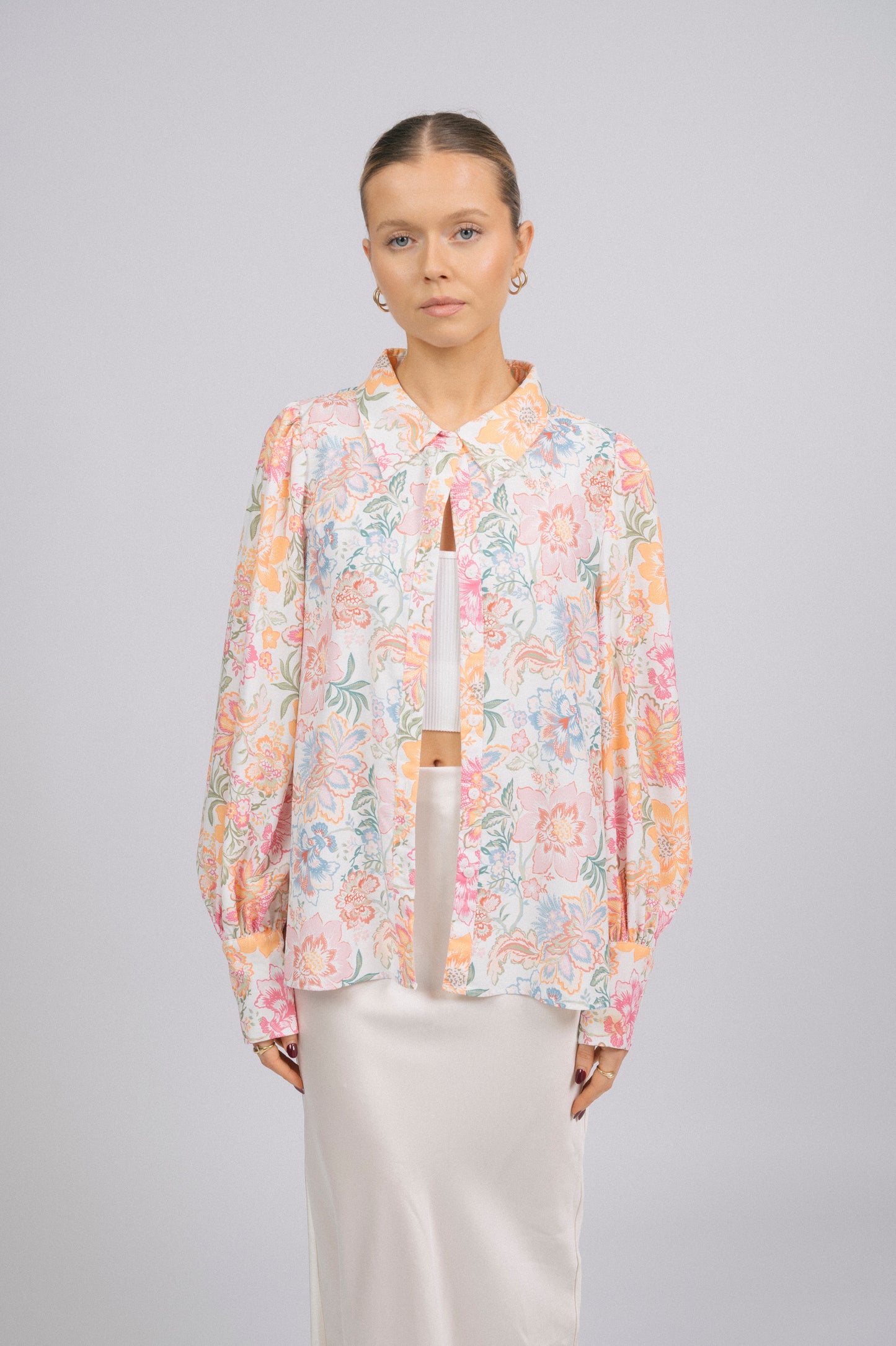 Vintage white floral long sleeved button-up collared shirt collar, puffy sleeves, and cuff detail - Lemon Lane Vintage
