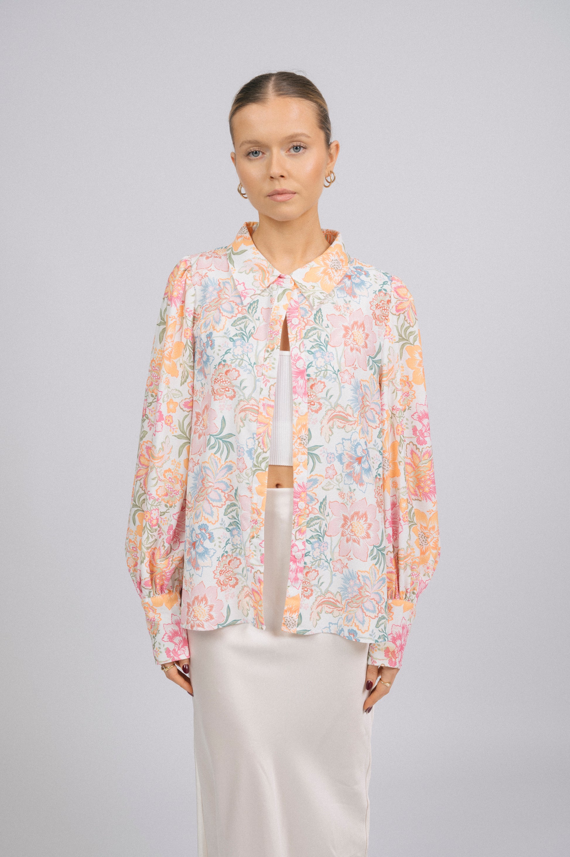 Vintage white floral long sleeved button-up collared shirt collar, puffy sleeves, and cuff detail - Lemon Lane Vintage