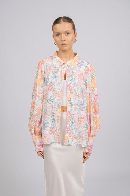 Vintage white floral long sleeved button-up collared shirt collar, puffy sleeves, and cuff detail - Lemon Lane Vintage