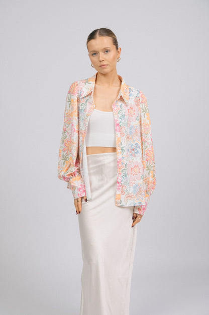 Vintage white floral long sleeved button-up collared shirt collar, puffy sleeves, and cuff detail - Lemon Lane Vintage