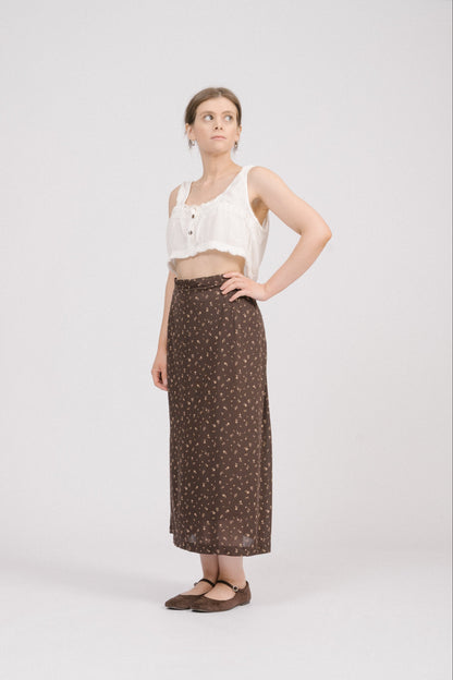 Side view of vintage brown floral midi skirt with invisible side zipper, metal snap closure, and relaxed midi fit. Soft heirloom-inspired vintage clothing Australia.