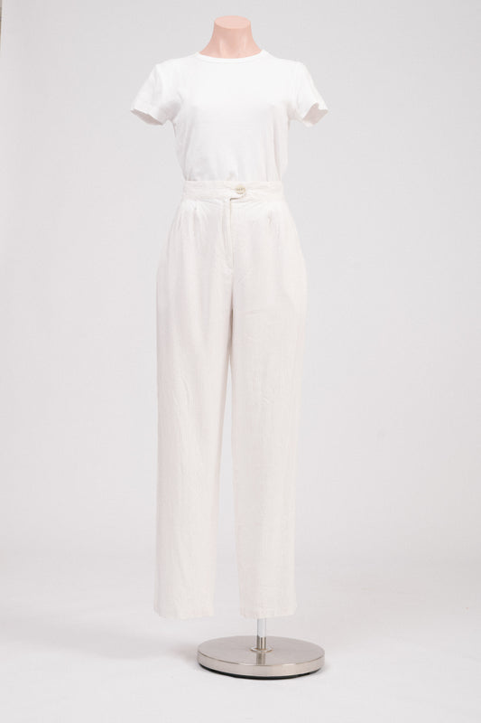 Front view of French vintage white and beige striped tailored pants, high-waisted with shell-look button.
