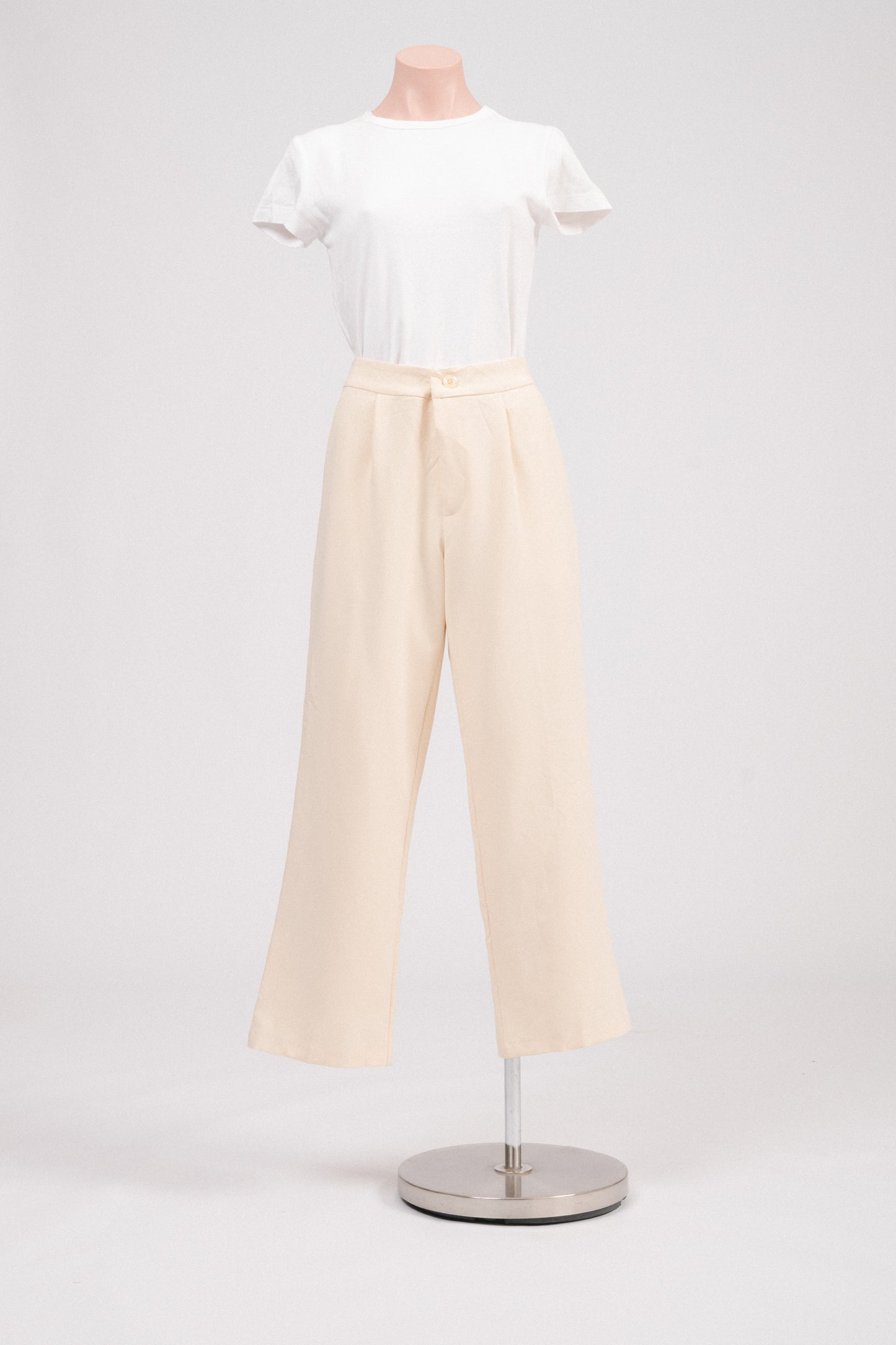 Preloved buttercream tailored pants front view.