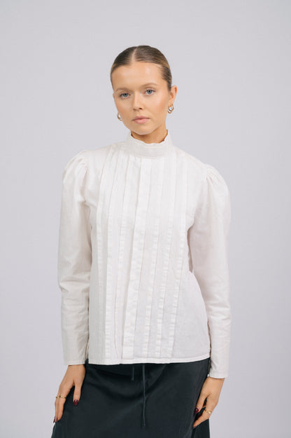 Vintage high neck long sleeved cotton blouse off white sleeve, hem detail prairie cottage core style close-up - Lemon Lane Vintage