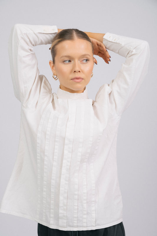 Vintage high neck long sleeved cotton blouse off white prairie cottage core style fabric texture and lace neckline detail close-up - Lemon Lane Vintage