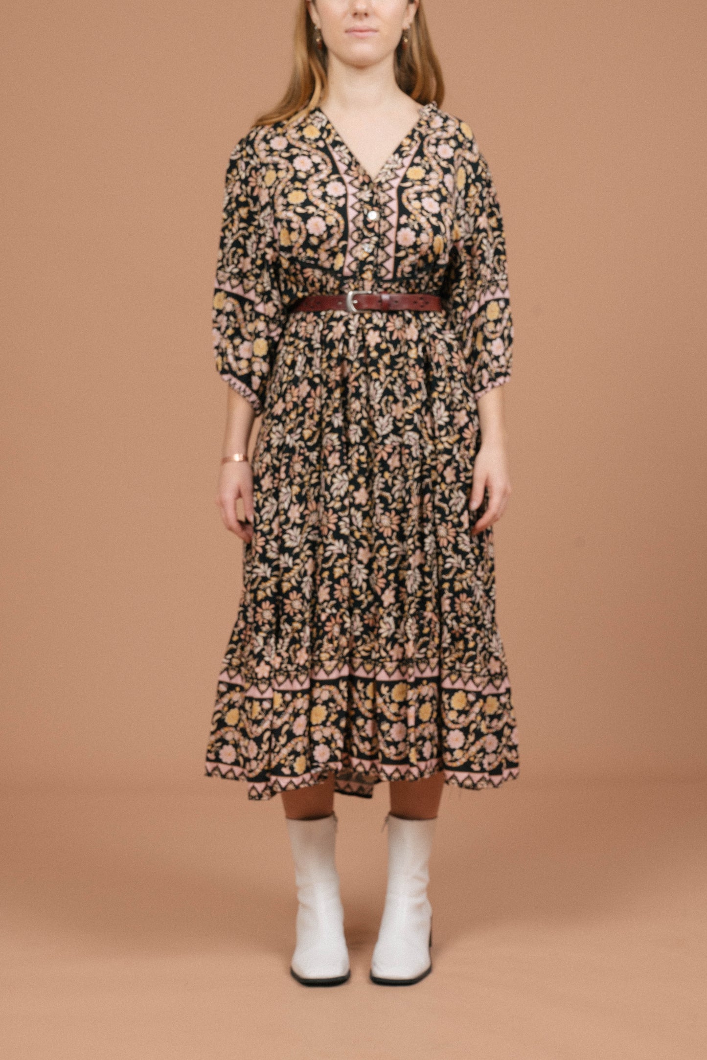 Vintage black floral midi dress with puffy sleeves and front buttons front view - Lemon Lane Vintage