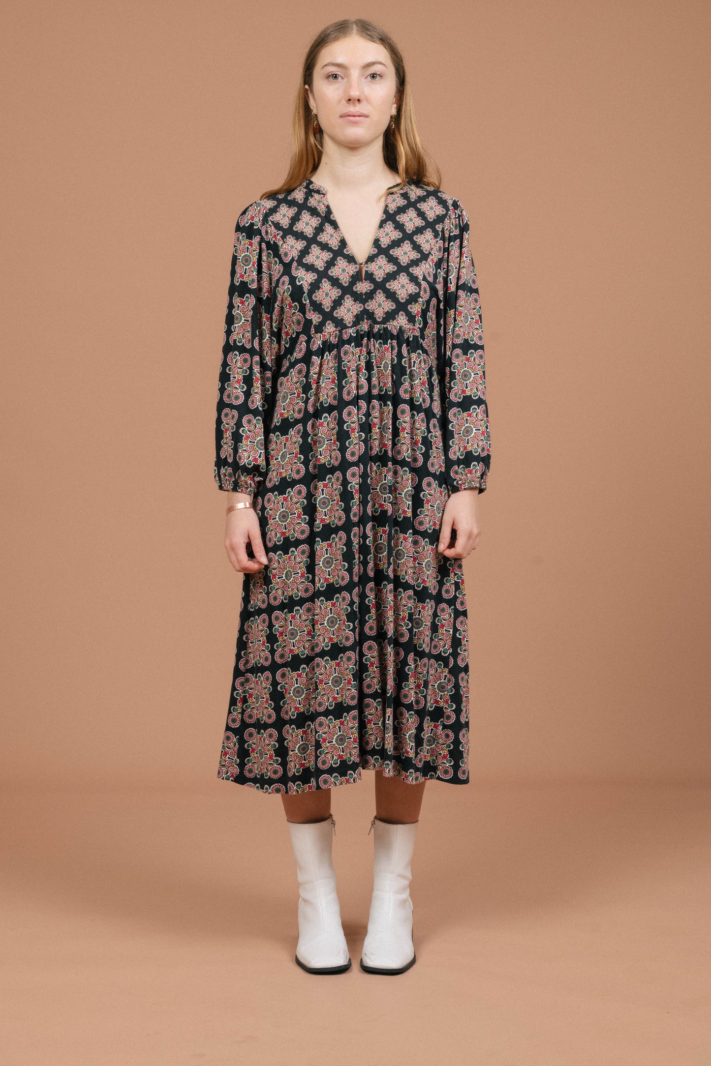 Vintage long sleeved black and multi-coloured maxi dress with geometric pattern front view - Lemon Lane Vintage