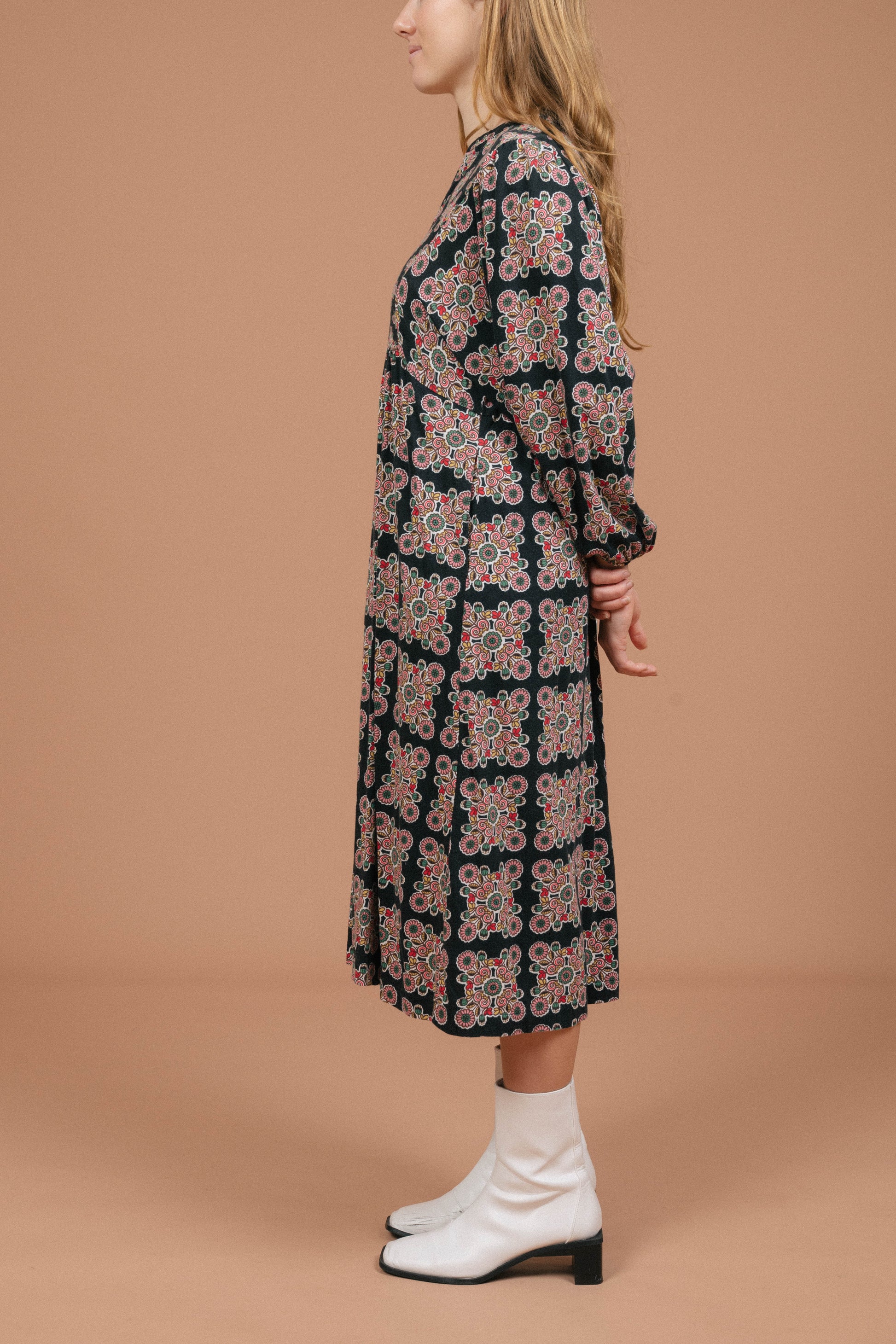 Vintage long sleeved black and multi-coloured maxi dress with geometric pattern side view - Lemon Lane Vintage