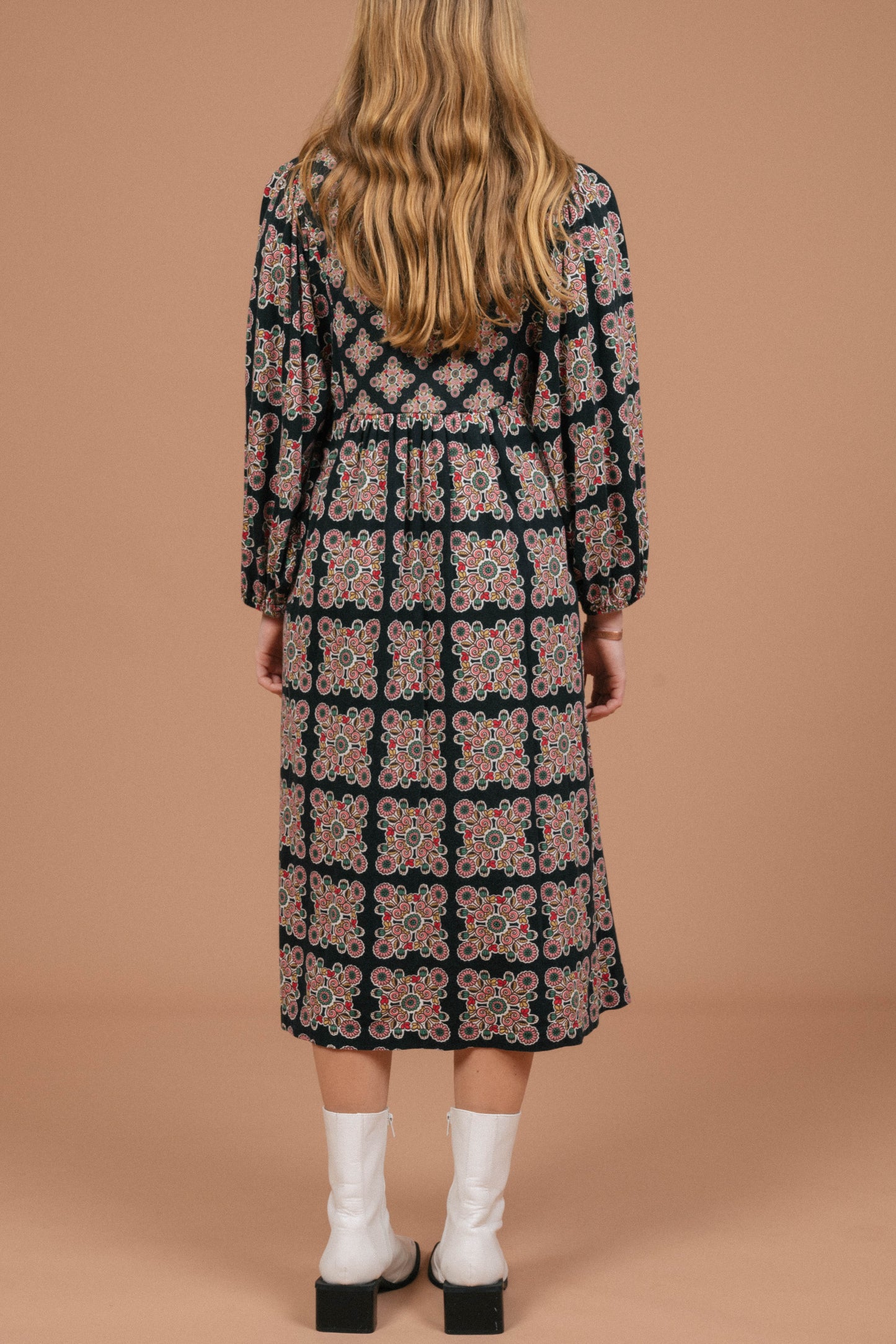 Vintage long sleeved black and multi-coloured maxi dress with geometric pattern back view - Lemon Lane Vintage