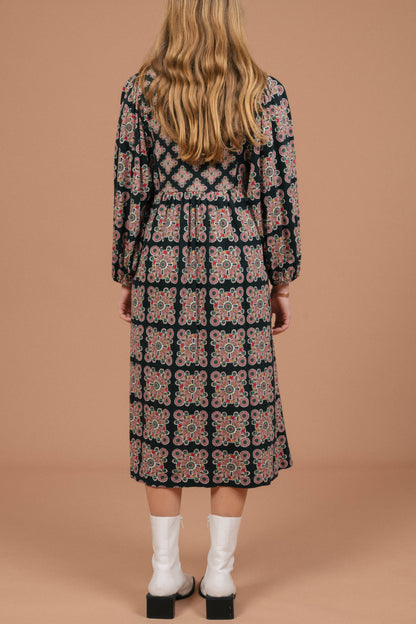 Vintage long sleeved black and multi-coloured maxi dress with geometric pattern back view - Lemon Lane Vintage