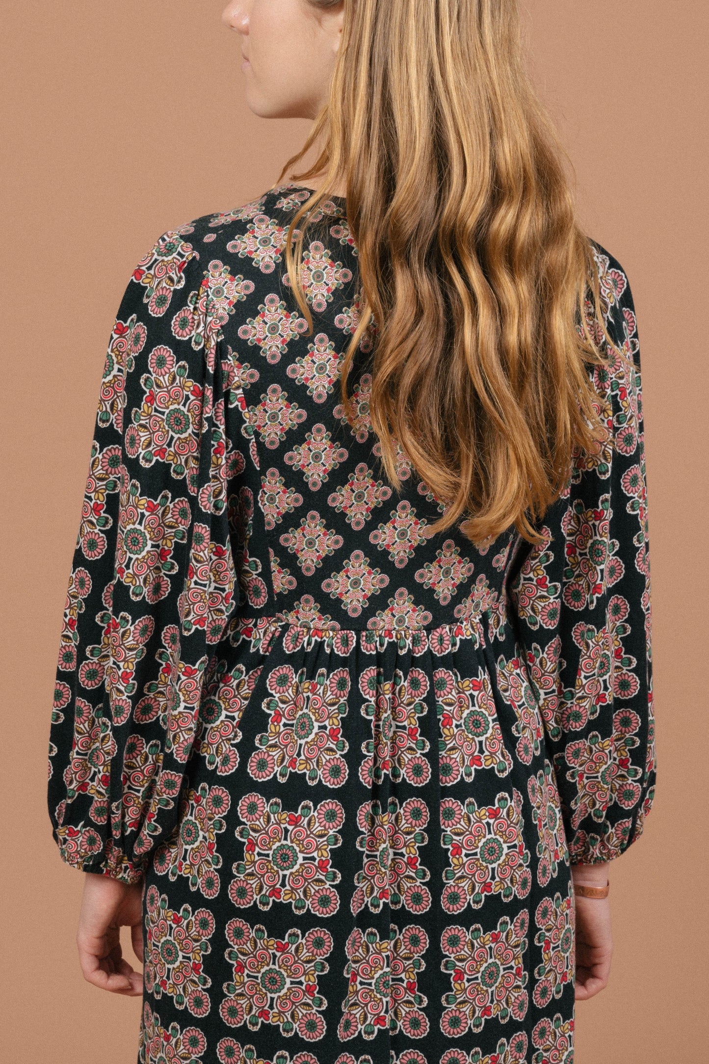 Vintage long sleeved black and multi-coloured maxi dress geometric pattern and fabric texture detail - Lemon Lane Vintage