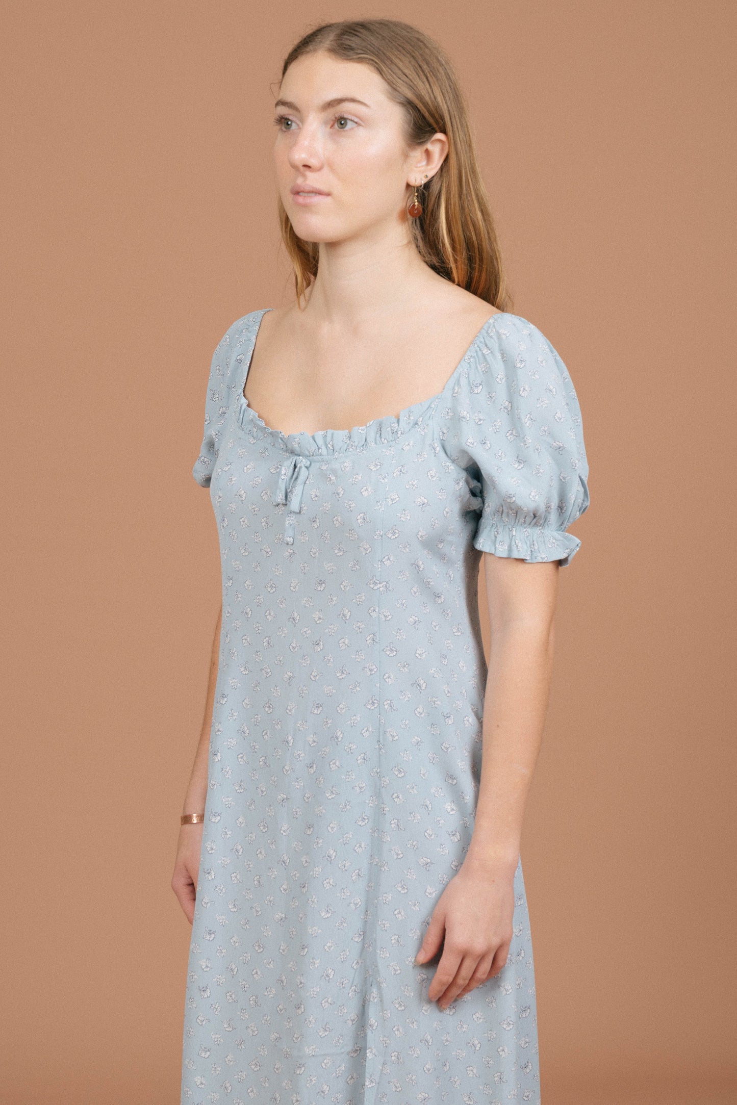 Vintage blue floral midi dress puffy cap sleeve, ruffle neckline, and fabric texture detail - Lemon Lane Vintage
