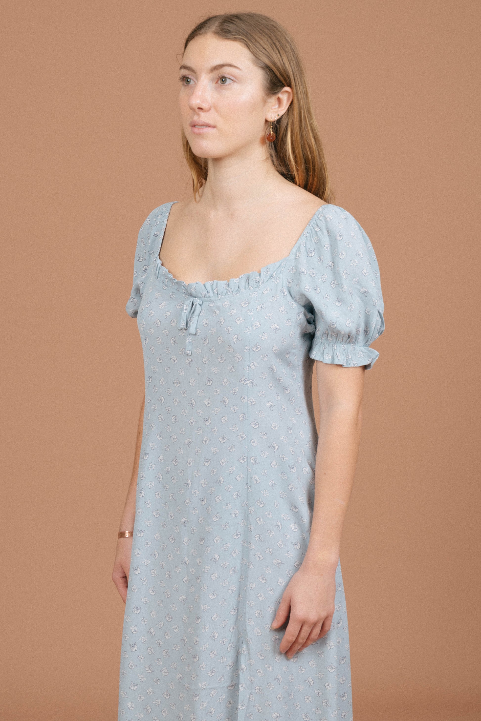 Vintage blue floral midi dress puffy cap sleeve, ruffle neckline, and fabric texture detail - Lemon Lane Vintage