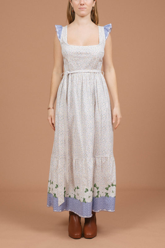 Vintage floral and polkadot prairie cottage core maxi dress with ruffle detailing in white and multi-coloured fabric front view - Lemon Lane Vintage