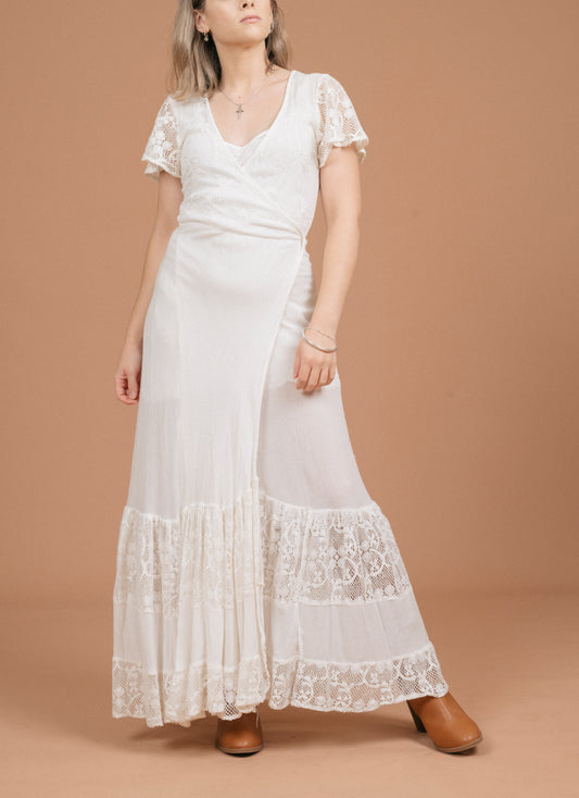 Vintage white wrap dress with lace detailing front view - Lemon Lane Vintage