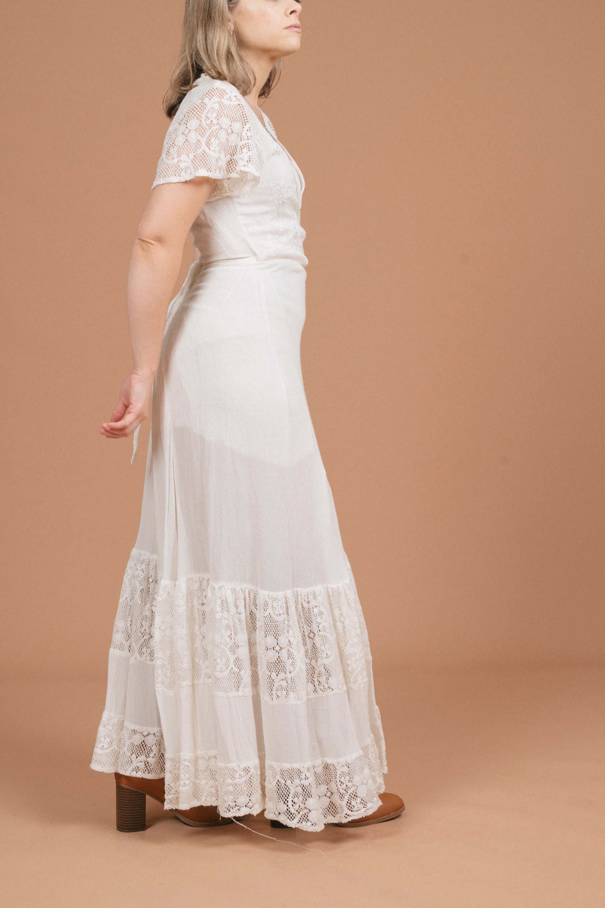 Vintage white wrap dress with lace detailing side view - Lemon Lane Vintage