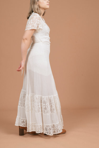 Vintage white wrap dress with lace detailing side view - Lemon Lane Vintage